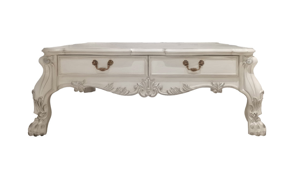 Side profile of 57-Inch Bone Wood Coffee Table showcasing carved details