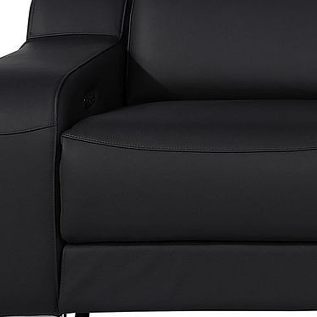 Lifestyle image of the 129" Black Italian Leather Reclining USB Sofa in a modern living room