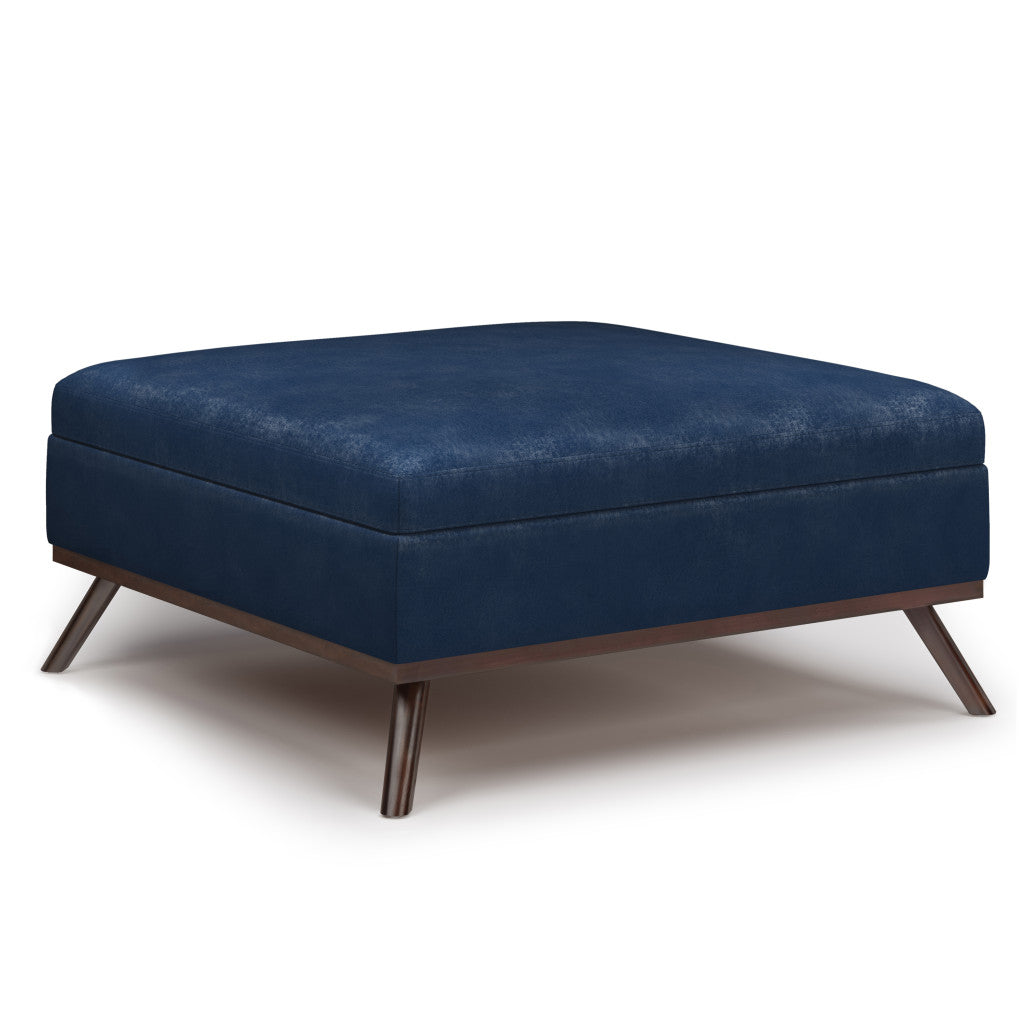 Side angle of 36" Blue and Brown Leather Cocktail Ottoman showcasing storage