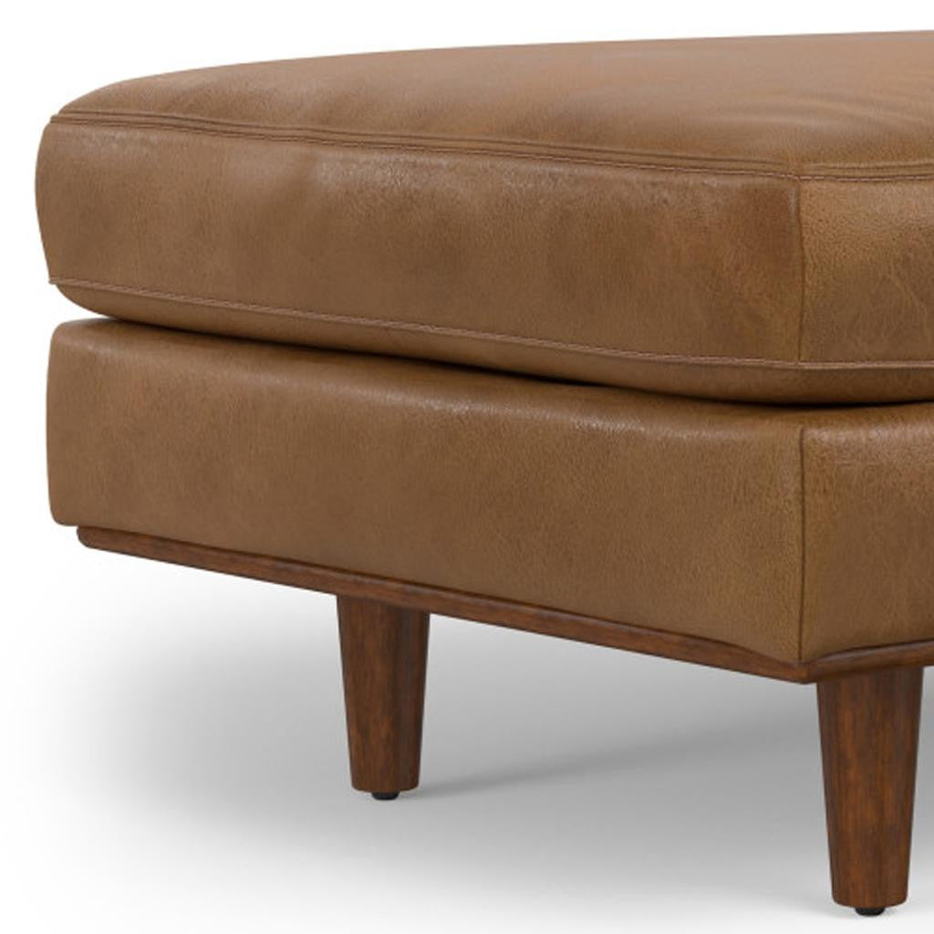 Top view of the spacious surface of the brown leather ottoman