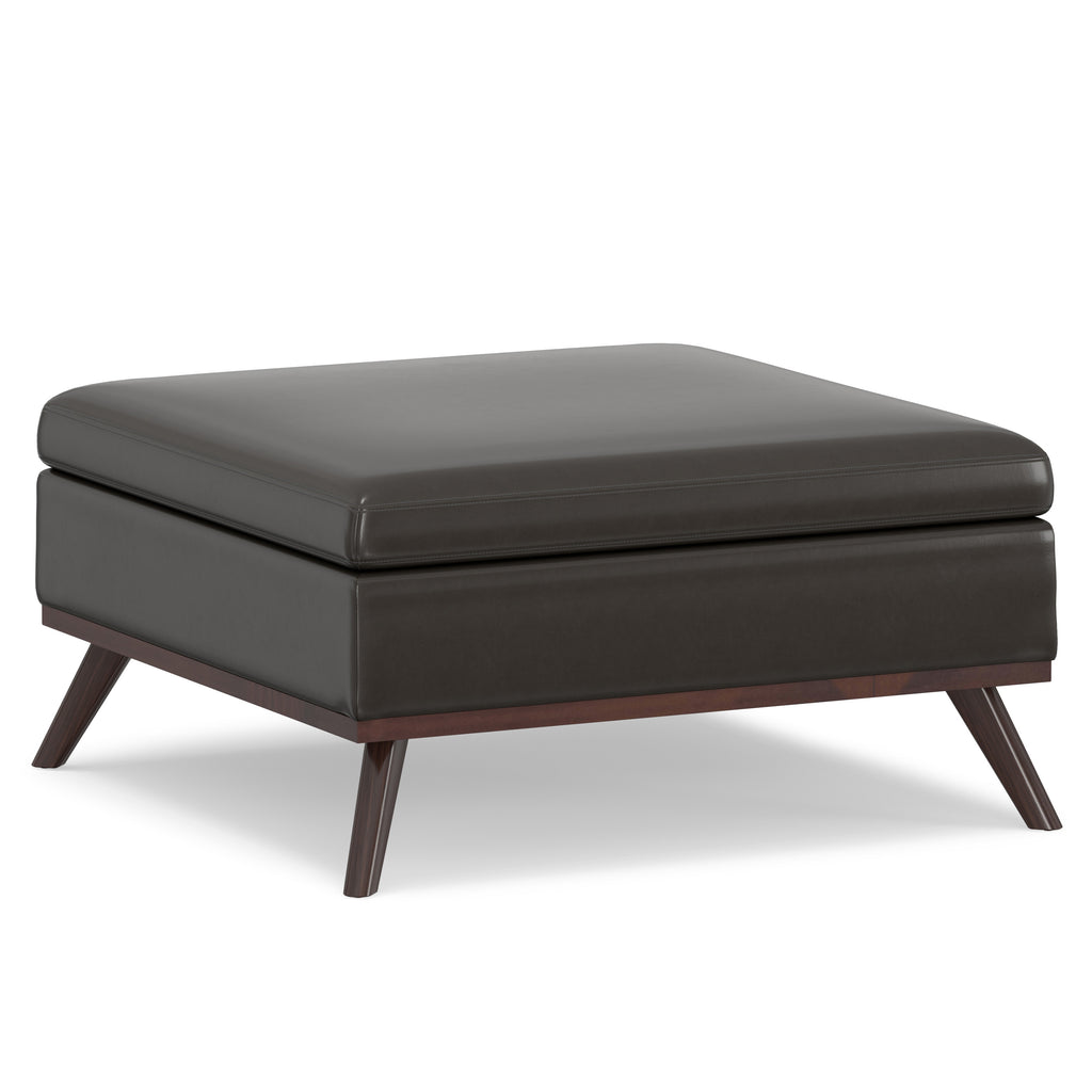 Living room setting with the 36-Inch Brown Leather Cocktail Ottoman in use