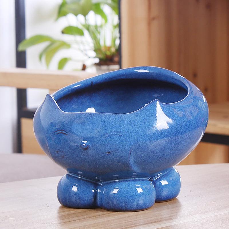 Top-down view of the Stylish Resin Cat Feeder with water dispenser