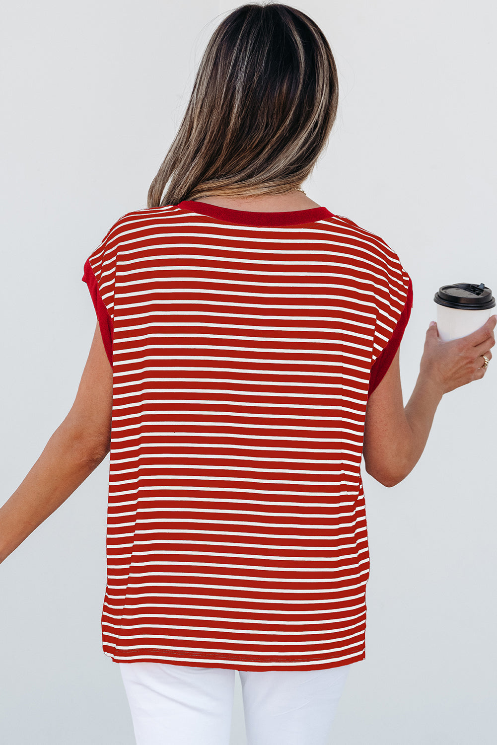 Side view of Annika Stripe Round Neck Tank Top highlighting patched pocket by Threaded Pear