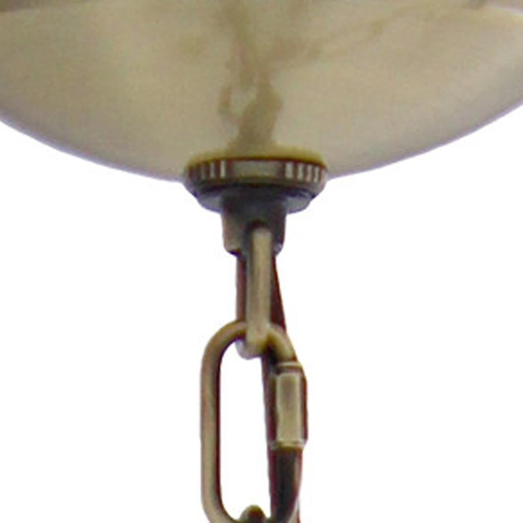 Close-up of the clear shades on the Antiqued Brass Chandelier