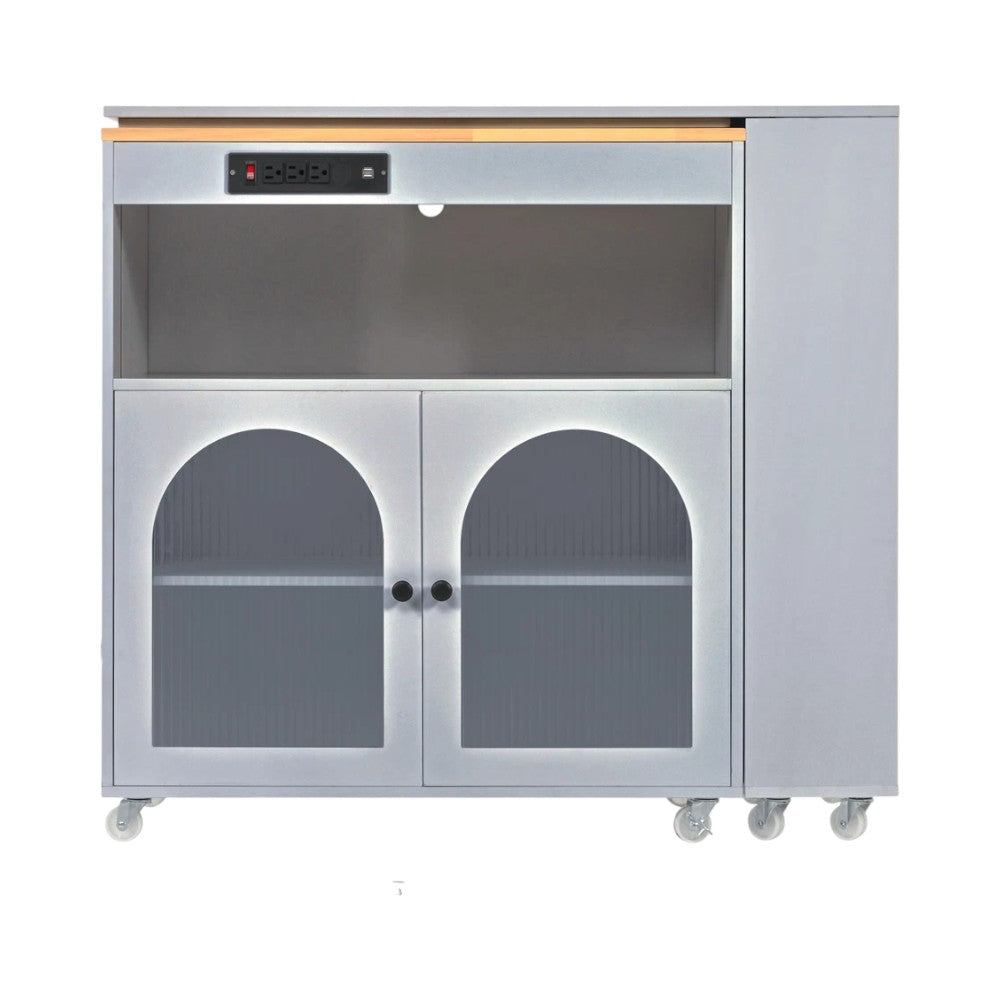 Lifestyle image of 33" Gray Wood Rolling Kitchen Island during meal prep