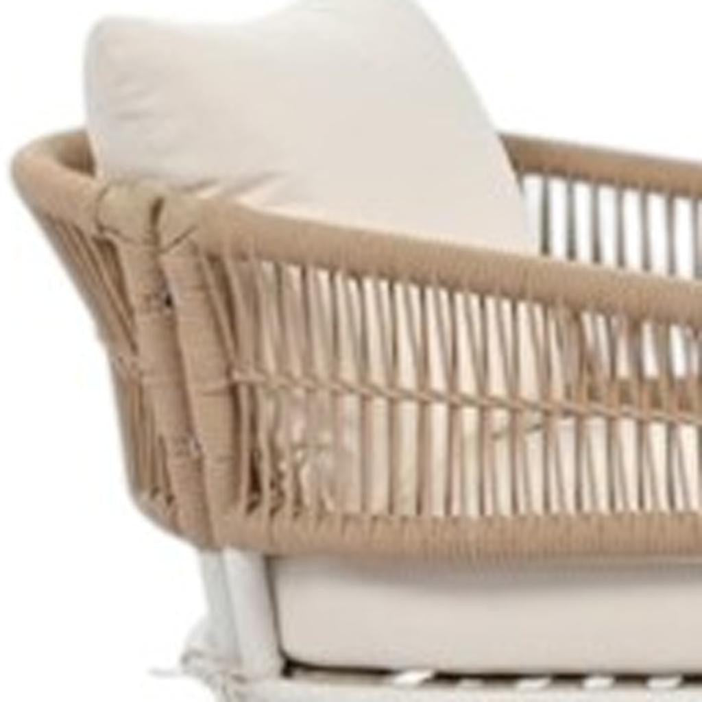 Comfortable seating arrangement of beige and white sofa set