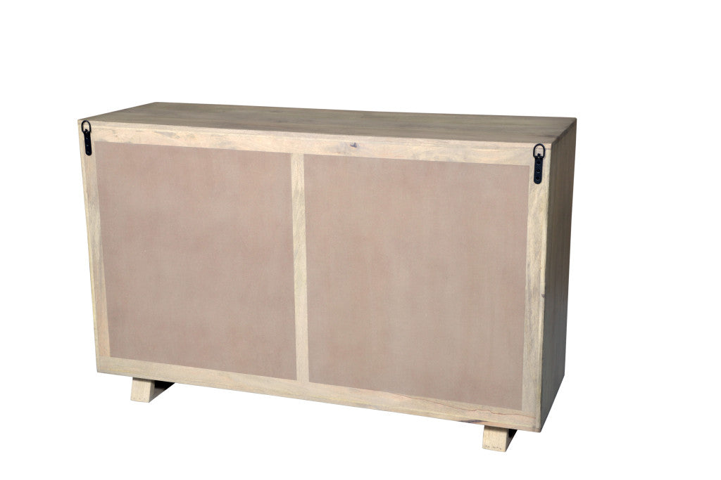 Close-up of the easy open drawer mechanism on the gray dresser