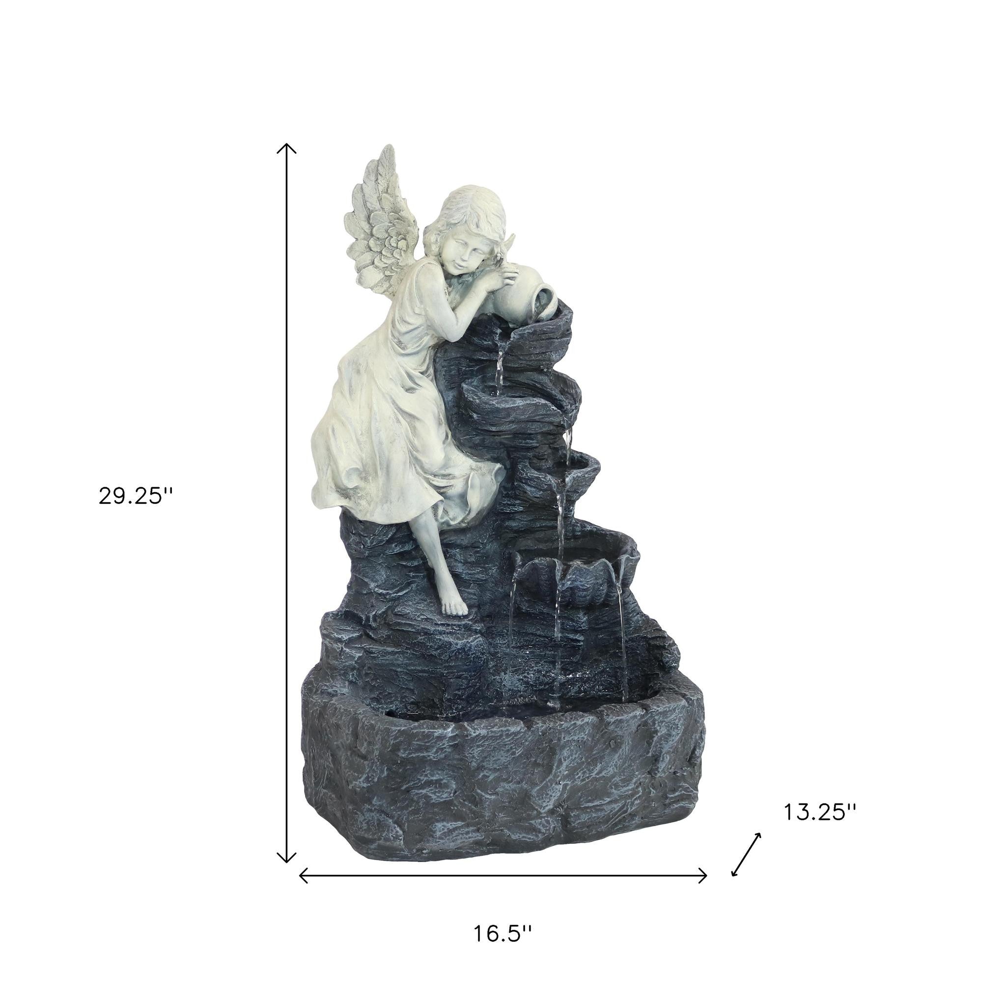 Side angle of 29-Inch Gray Polyresin LED Garden Art in outdoor setting