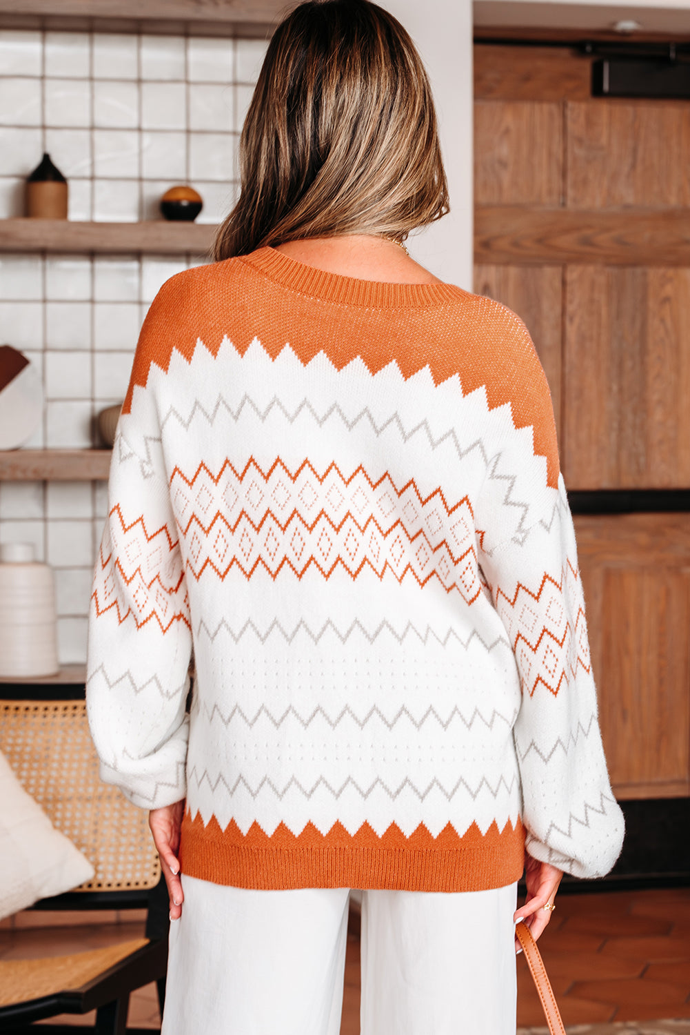 Side view showcasing the vibrant zigzag pattern of Daphne Sweater