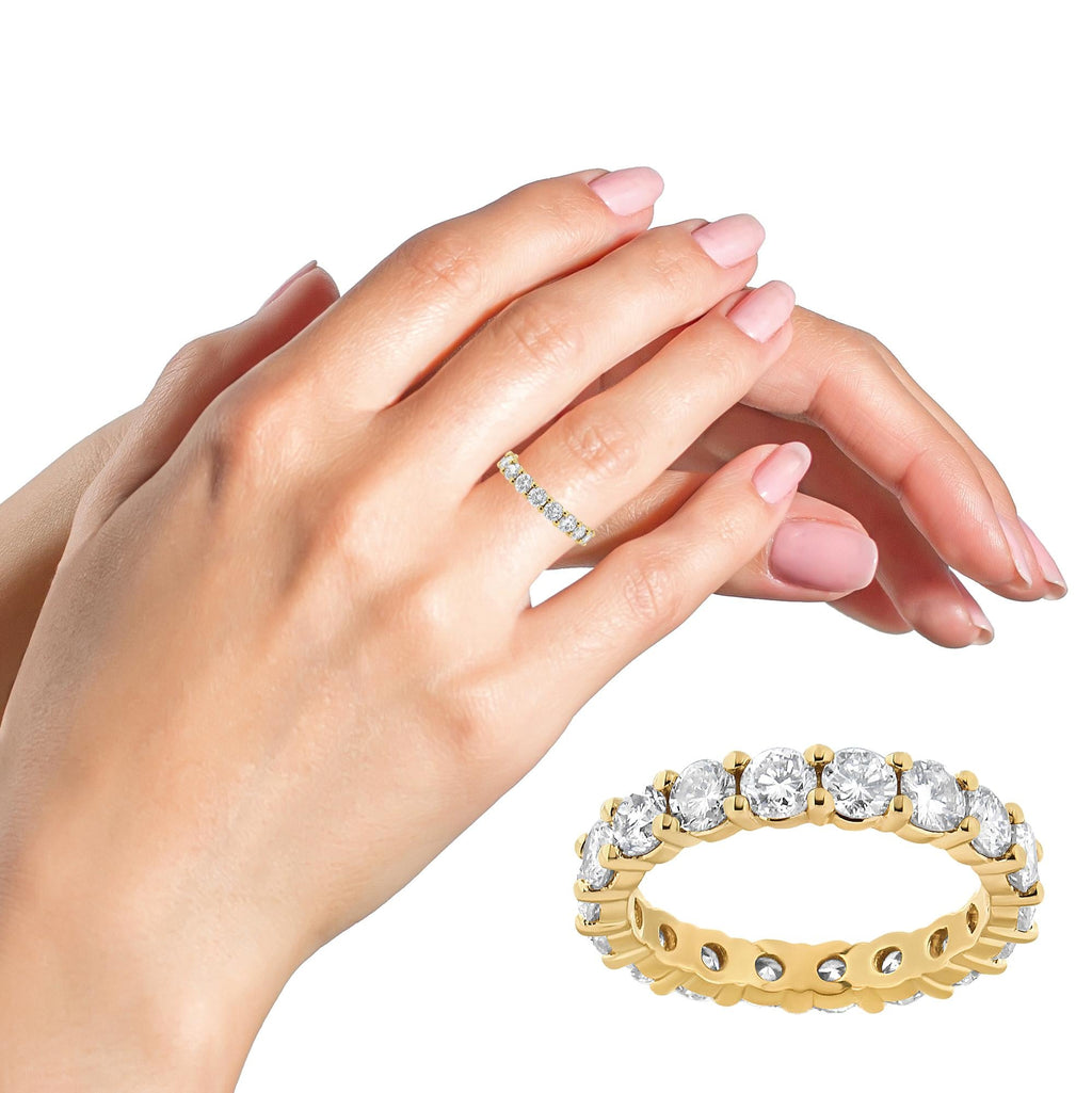 Lifestyle shot of the 14K Yellow Gold Diamond Eternity Band worn on a hand