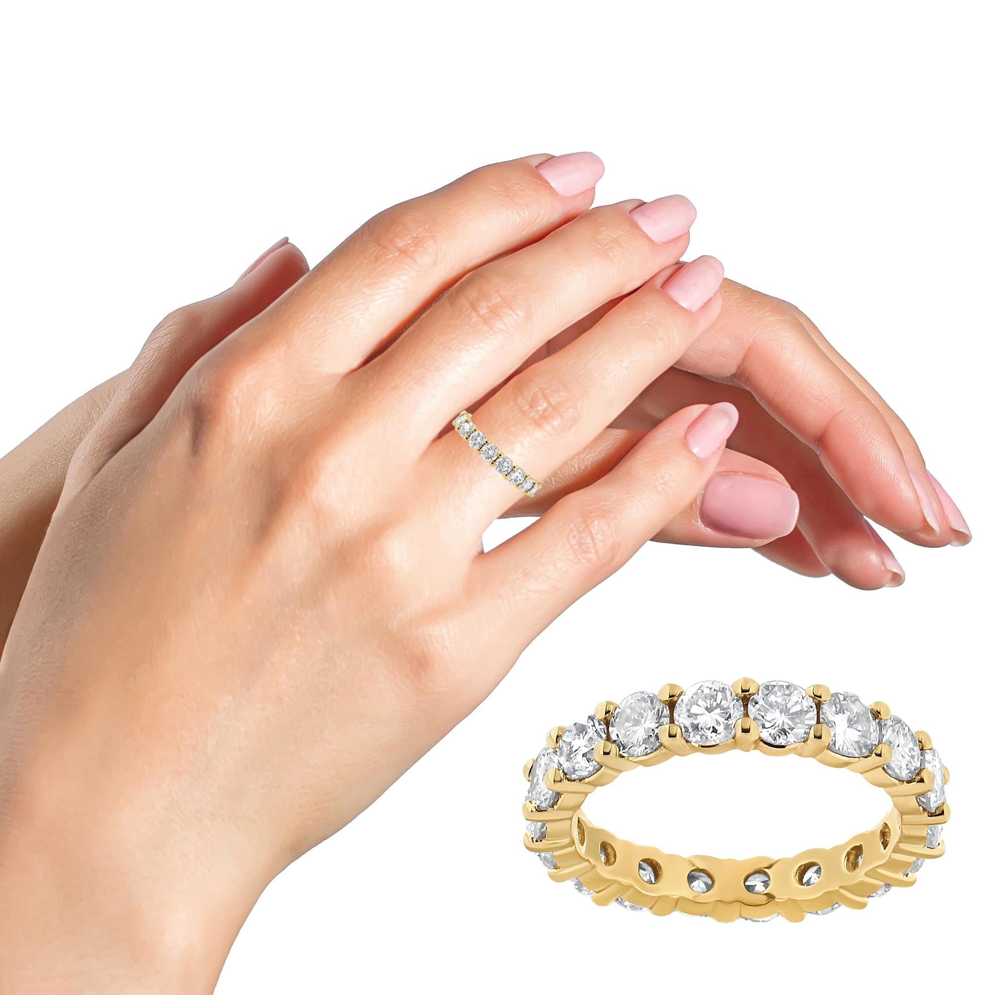 Lifestyle shot of the 14K Yellow Gold Diamond Eternity Band worn on a hand