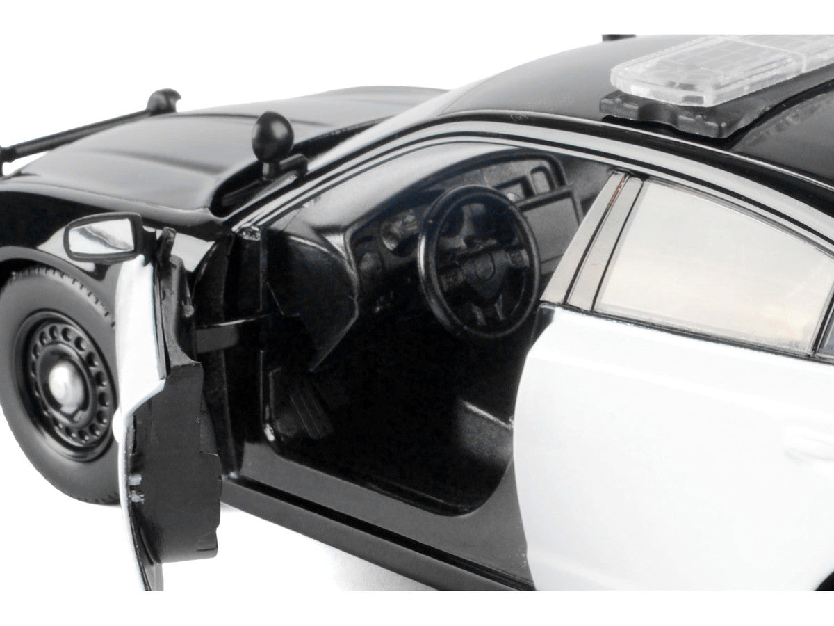 Close-up of the interior details of 2023 Dodge Charger Police Diecast Model