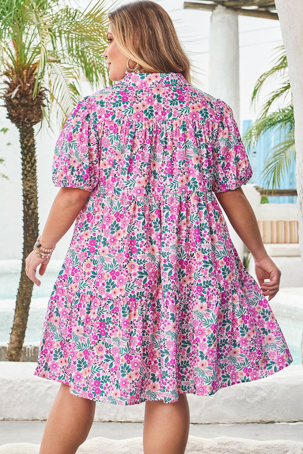 Side view of Plus Size Floral Dress showcasing tiered skirt and puff sleeves
