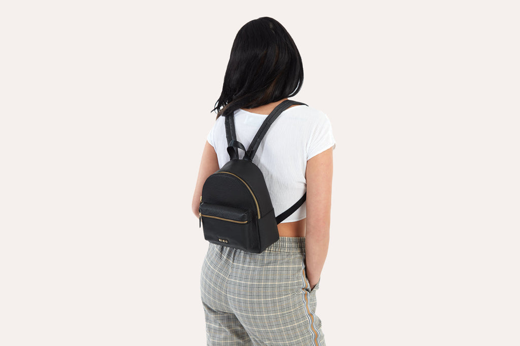 Itty-Bitty Backpack in use on a stylish woman by Kiko