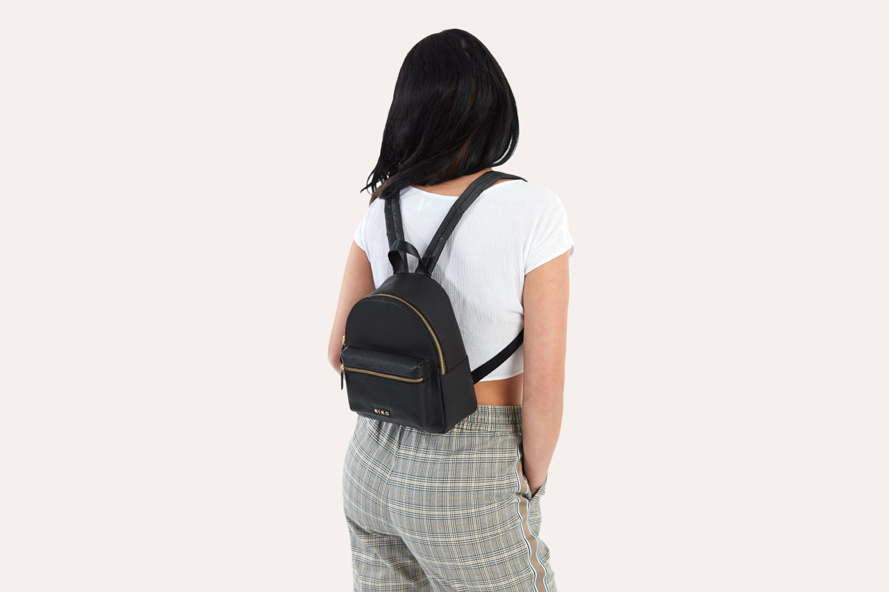 Itty-Bitty Backpack in use on a stylish woman by Kiko