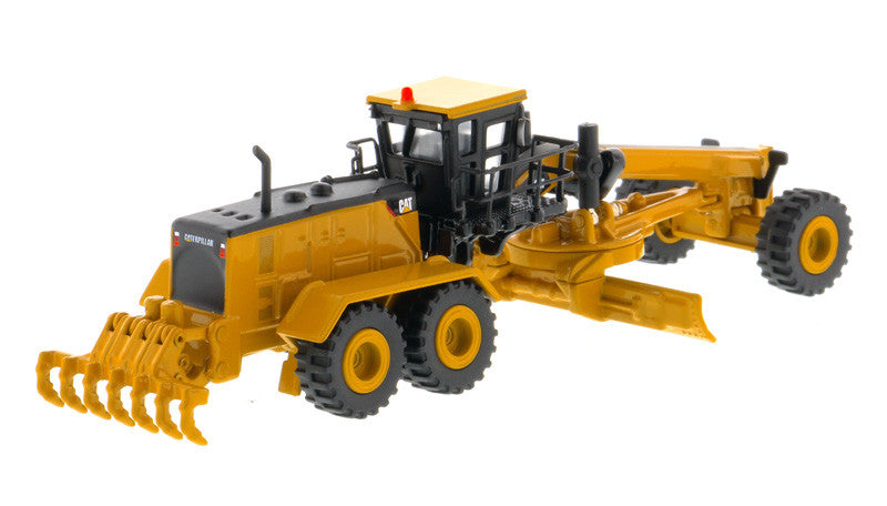 Rear view of CAT 24M Motor Grader diecast model showcasing realistic tires