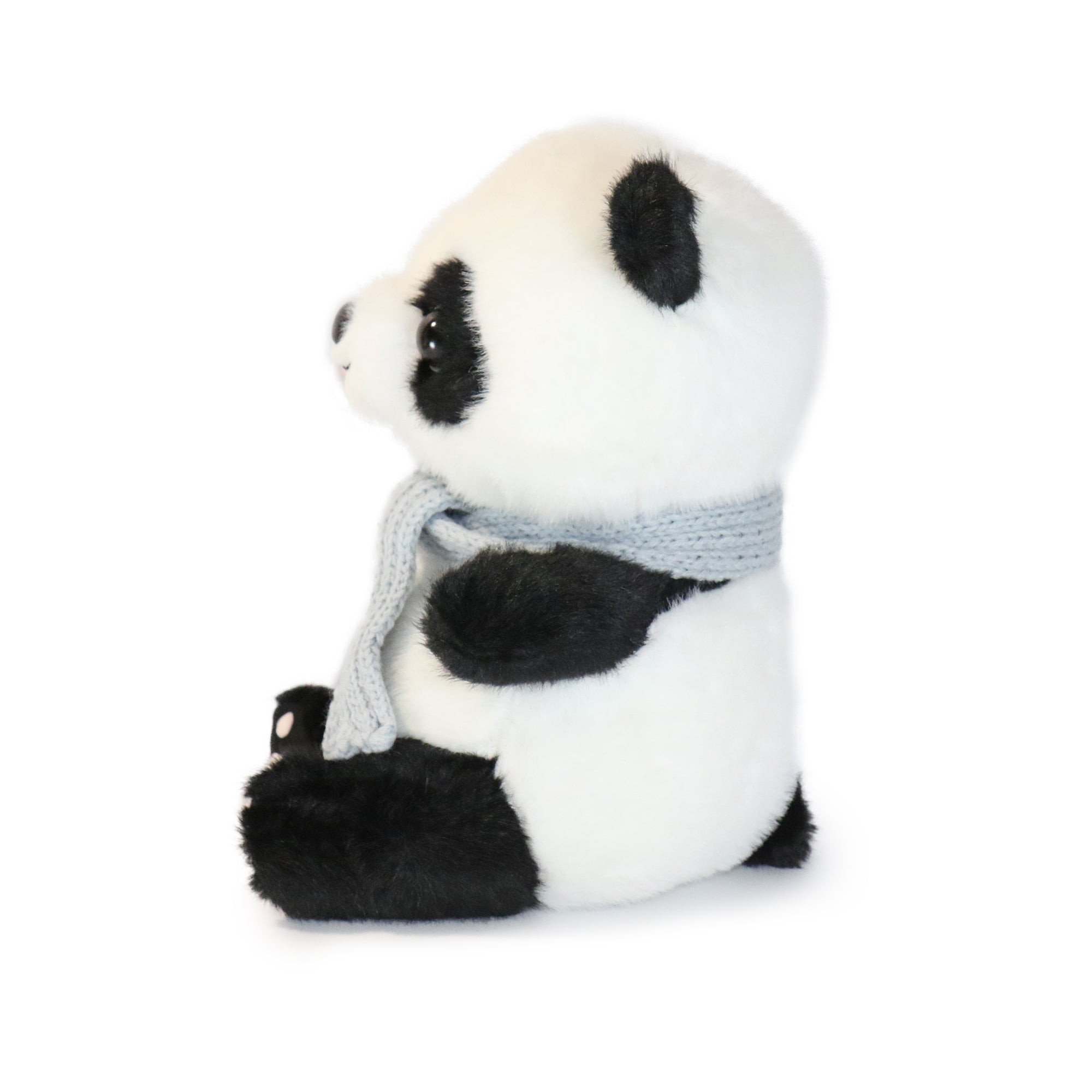 Blush Panda Plush Toy showcased in a stylish home decor setting