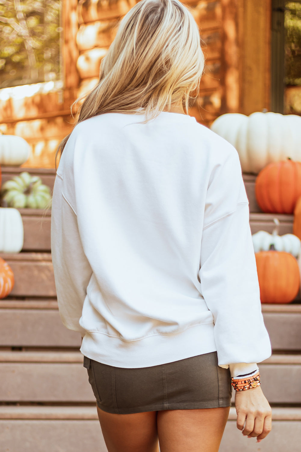 Close-up of pumpkin patch details on Blair Pullover Sweatshirt