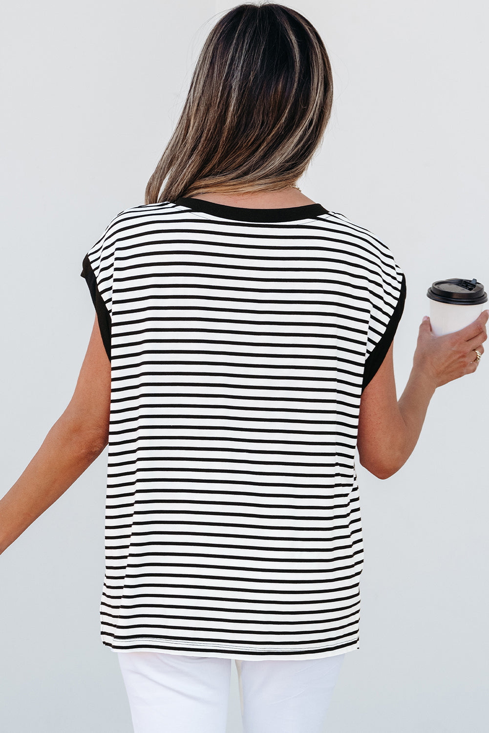 Side view showcasing the chic design of Trendy Striped Pocket Tank Top by Threaded Pear