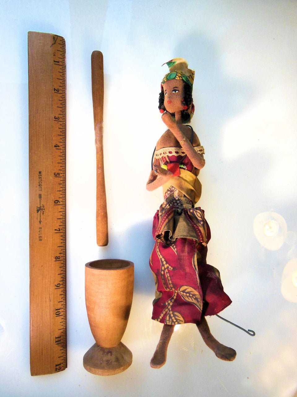 Side view showcasing intricate details of Mother & Child Doll