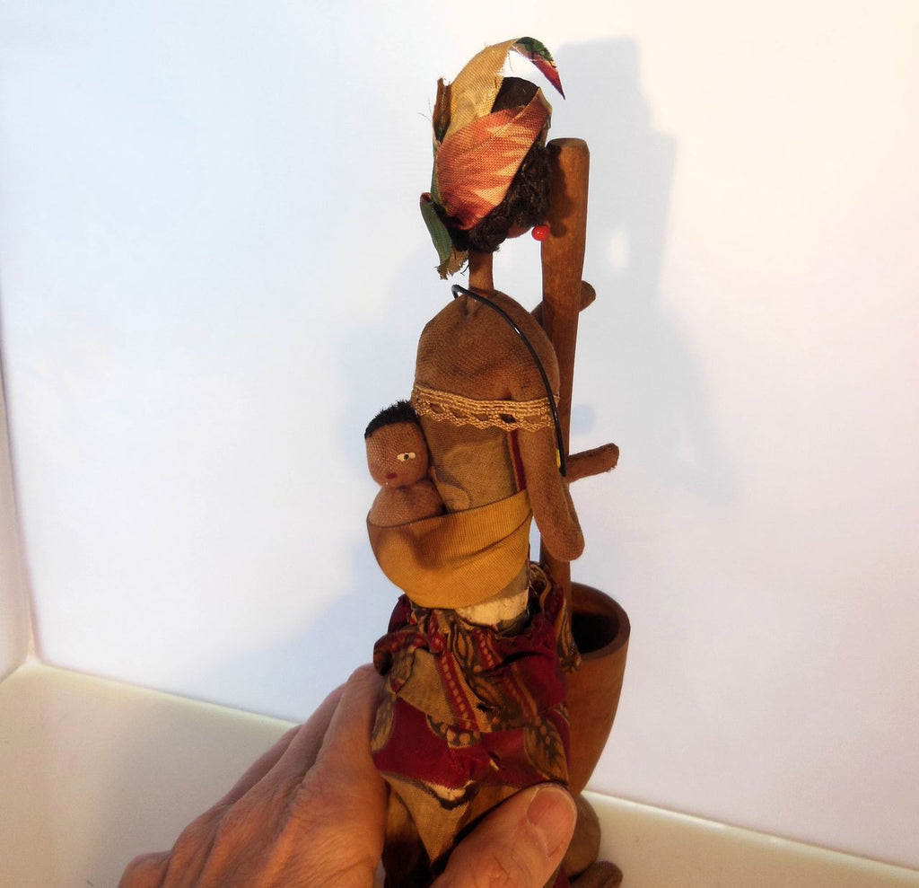 Wooden pot included with African Mother & Child Doll