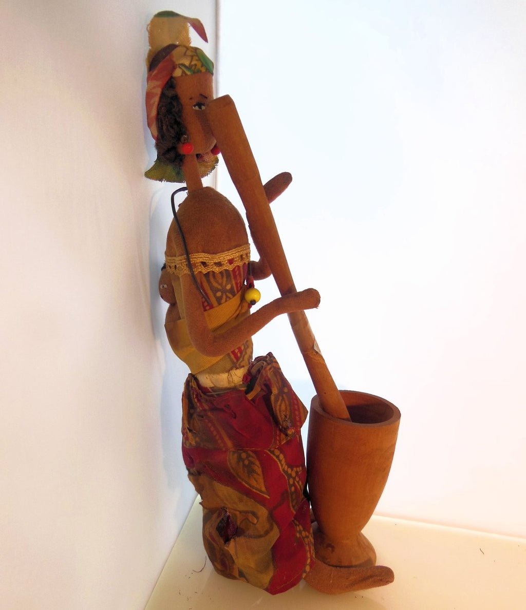 Stirring stick featured with the Vintage African Doll