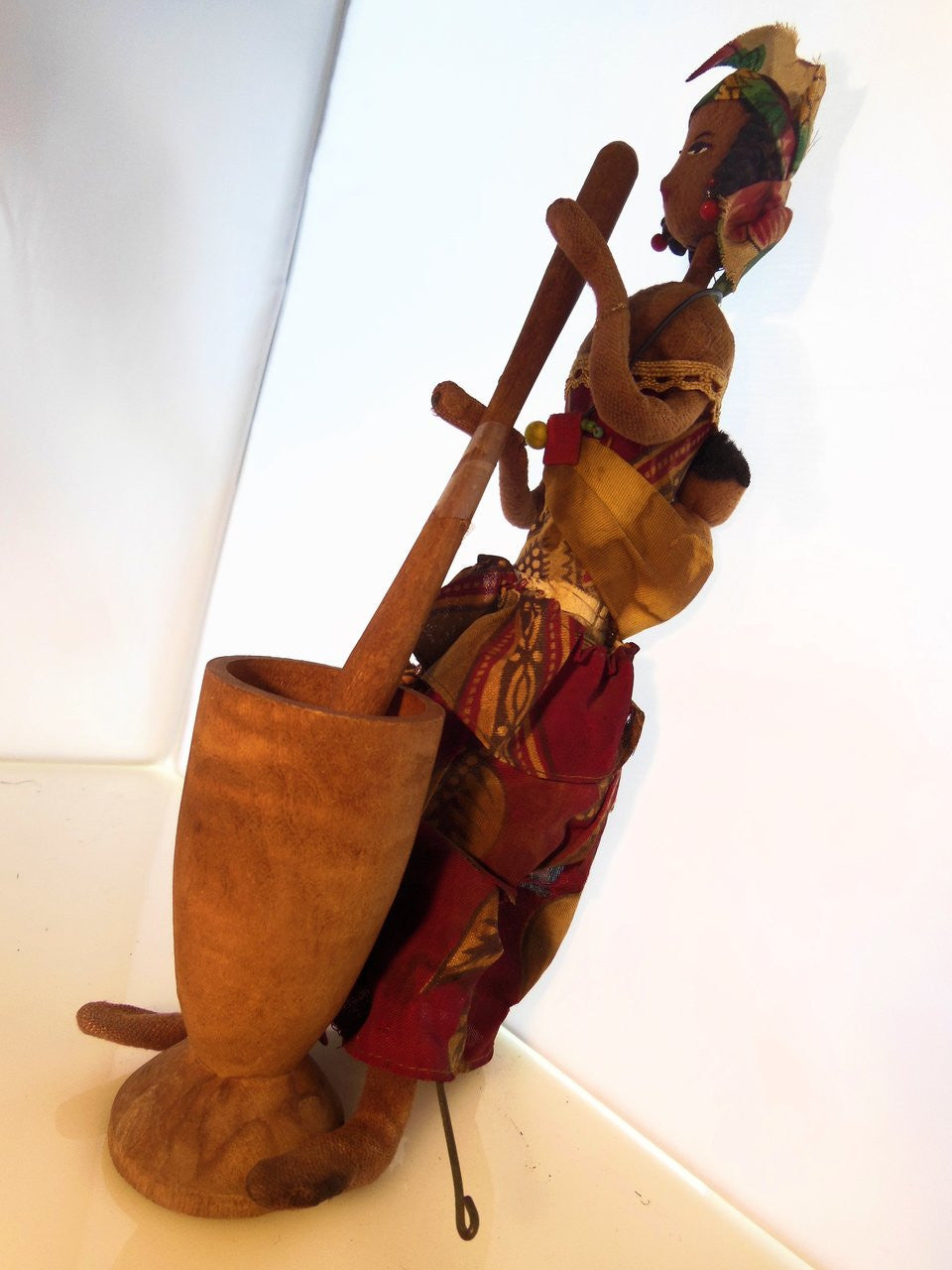 Elegant presentation of the Vintage African Mother & Child Doll