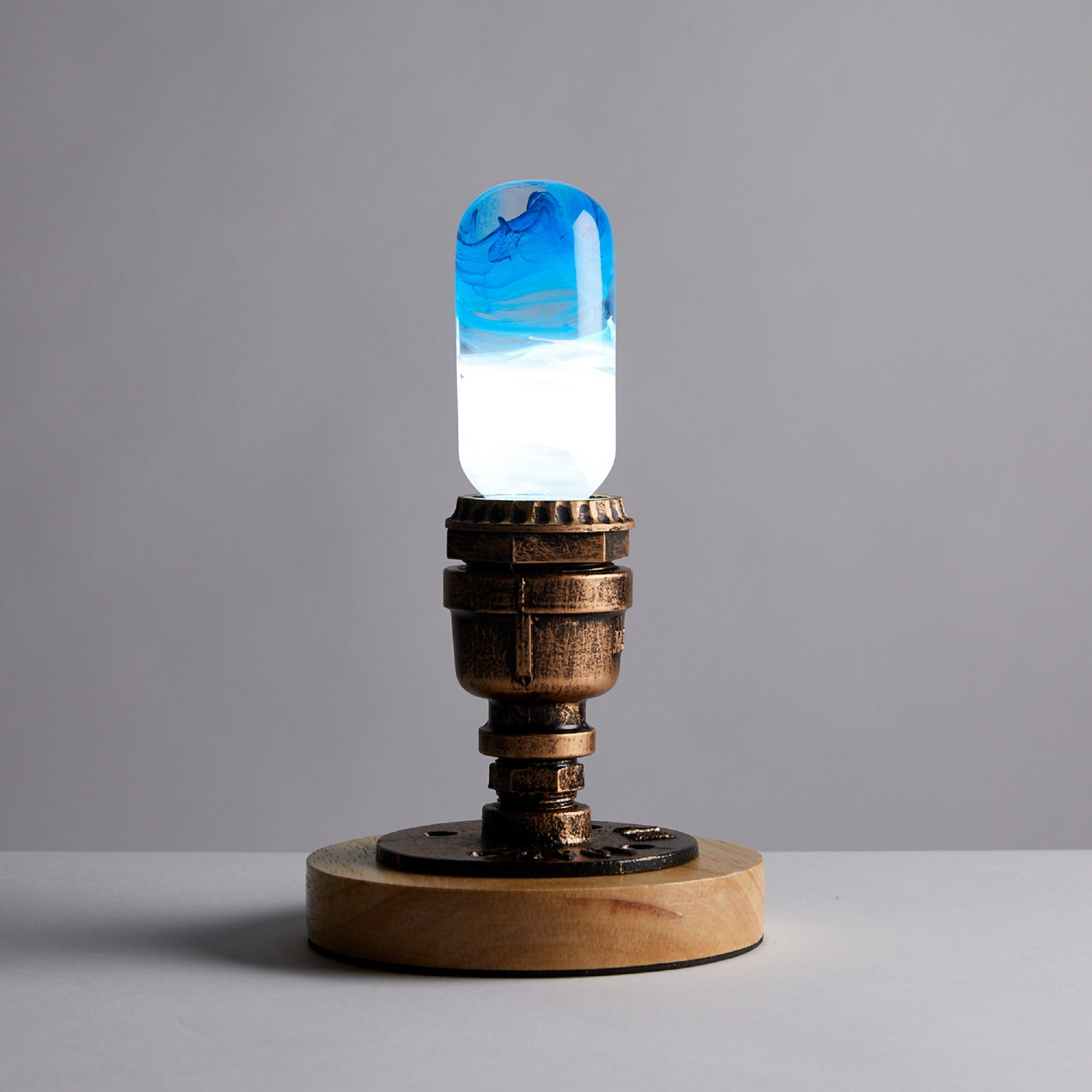 Eco-Friendly Blue LED Lamp by EP LIGHT on a table adding modern decor