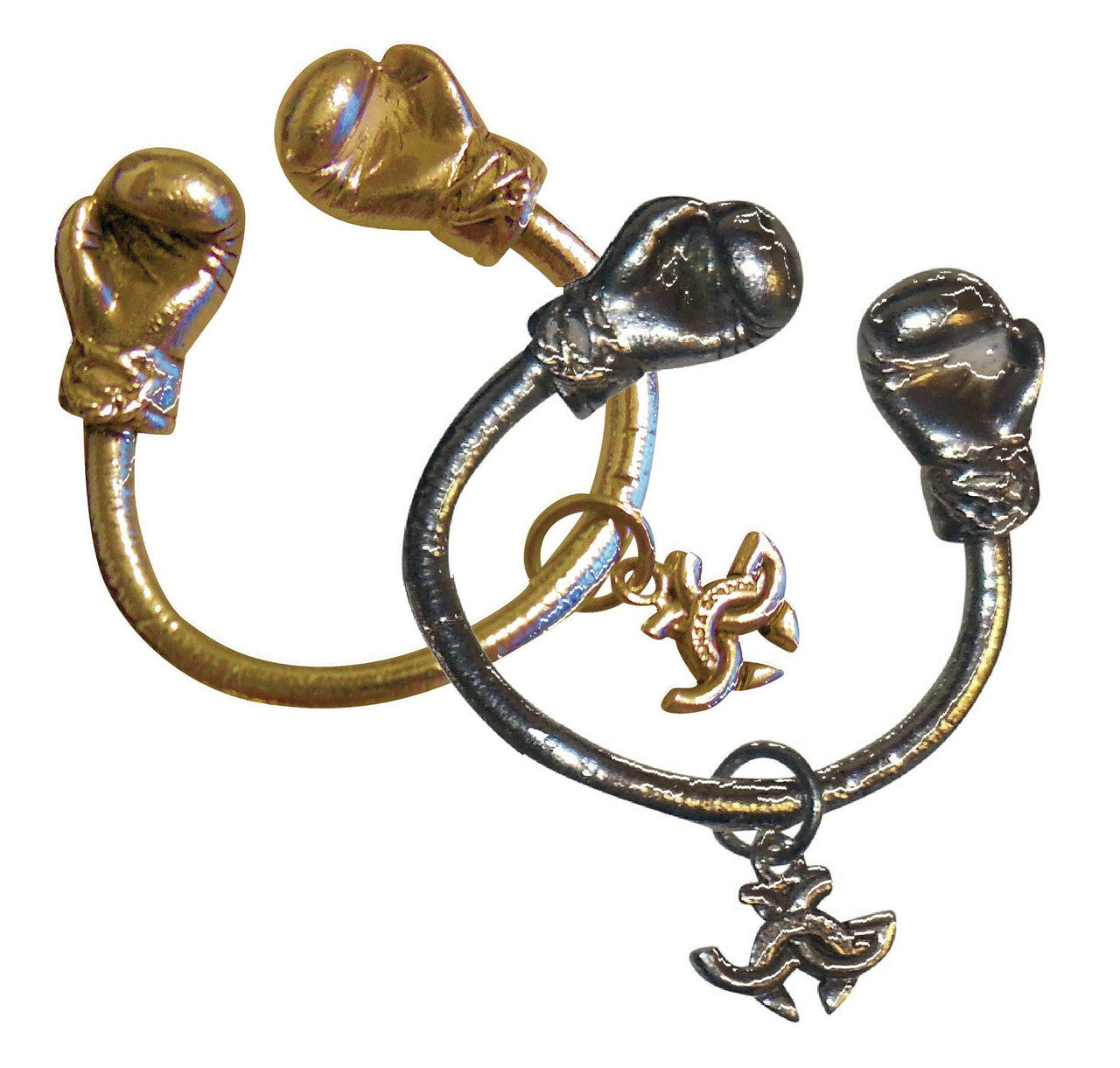 Artistic view of 18K Gold Boxing Glove Key Ring against a dark surface