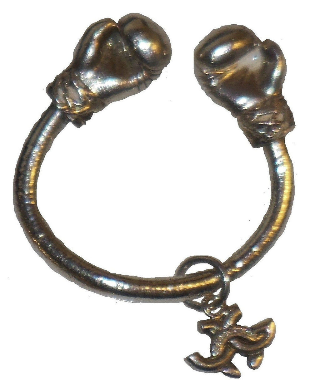 18K Gold Boxing Glove Key Ring on a stylish desk setup