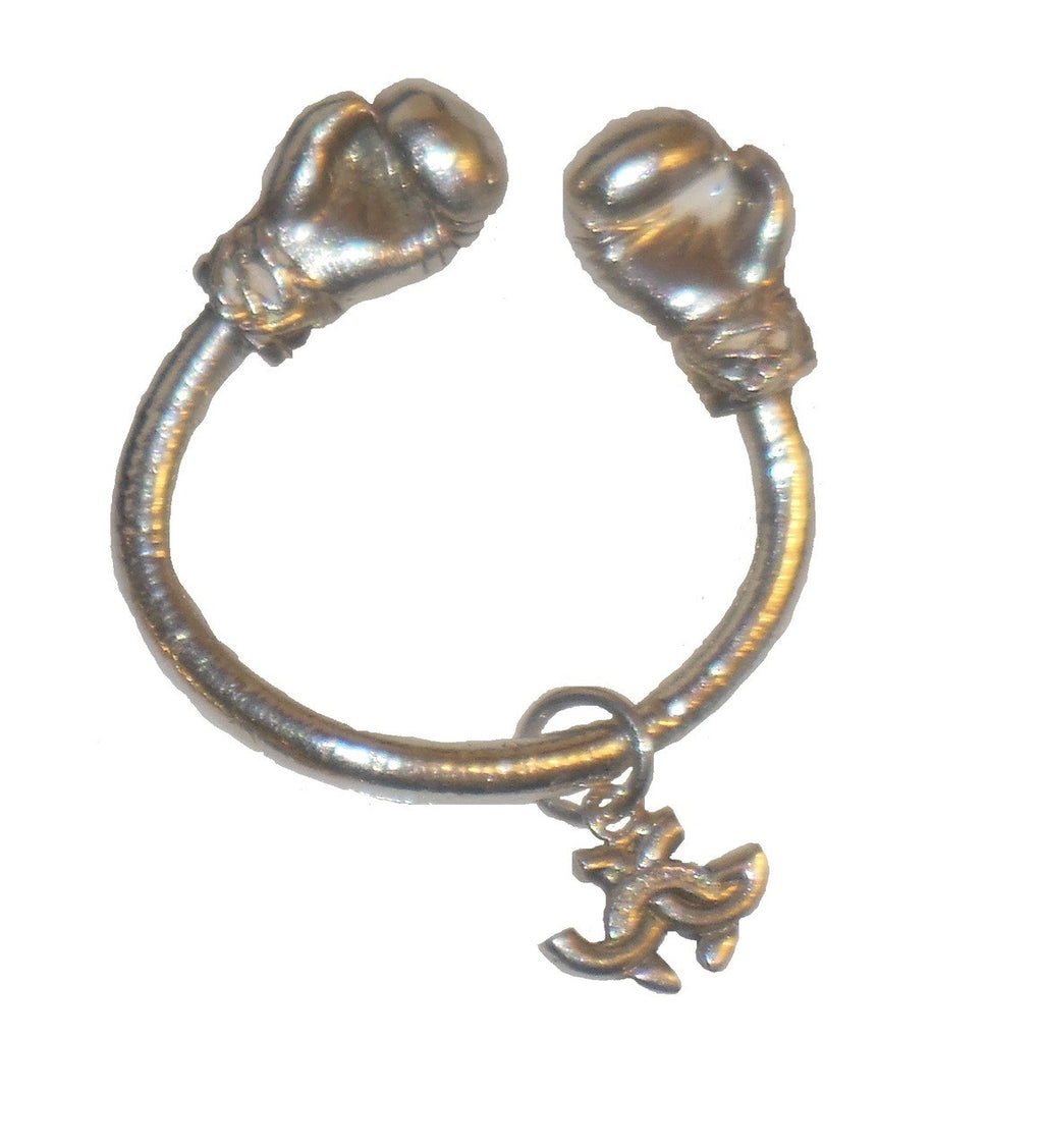 18K Gold Boxing Glove Key Ring in a gym bag