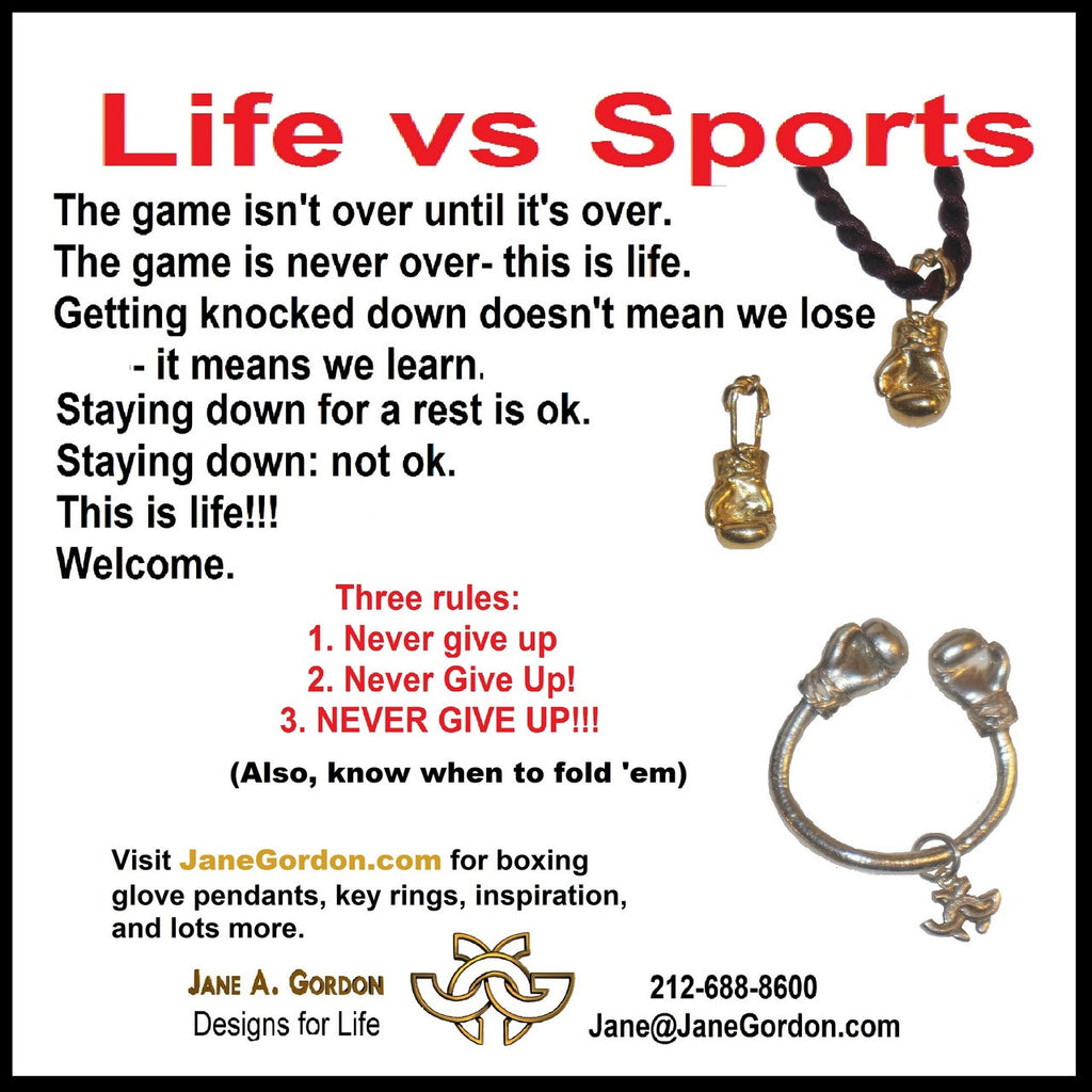 18K Gold Boxing Glove Key Ring with natural lighting