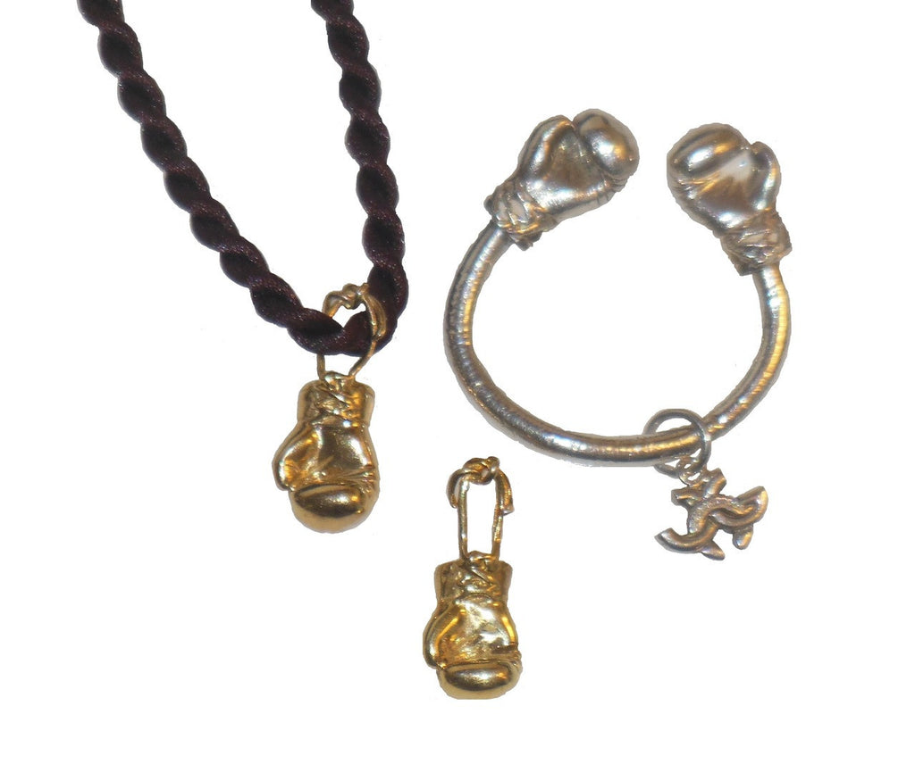 Lifestyle shot of 18K Gold Boxing Glove Key Ring in use