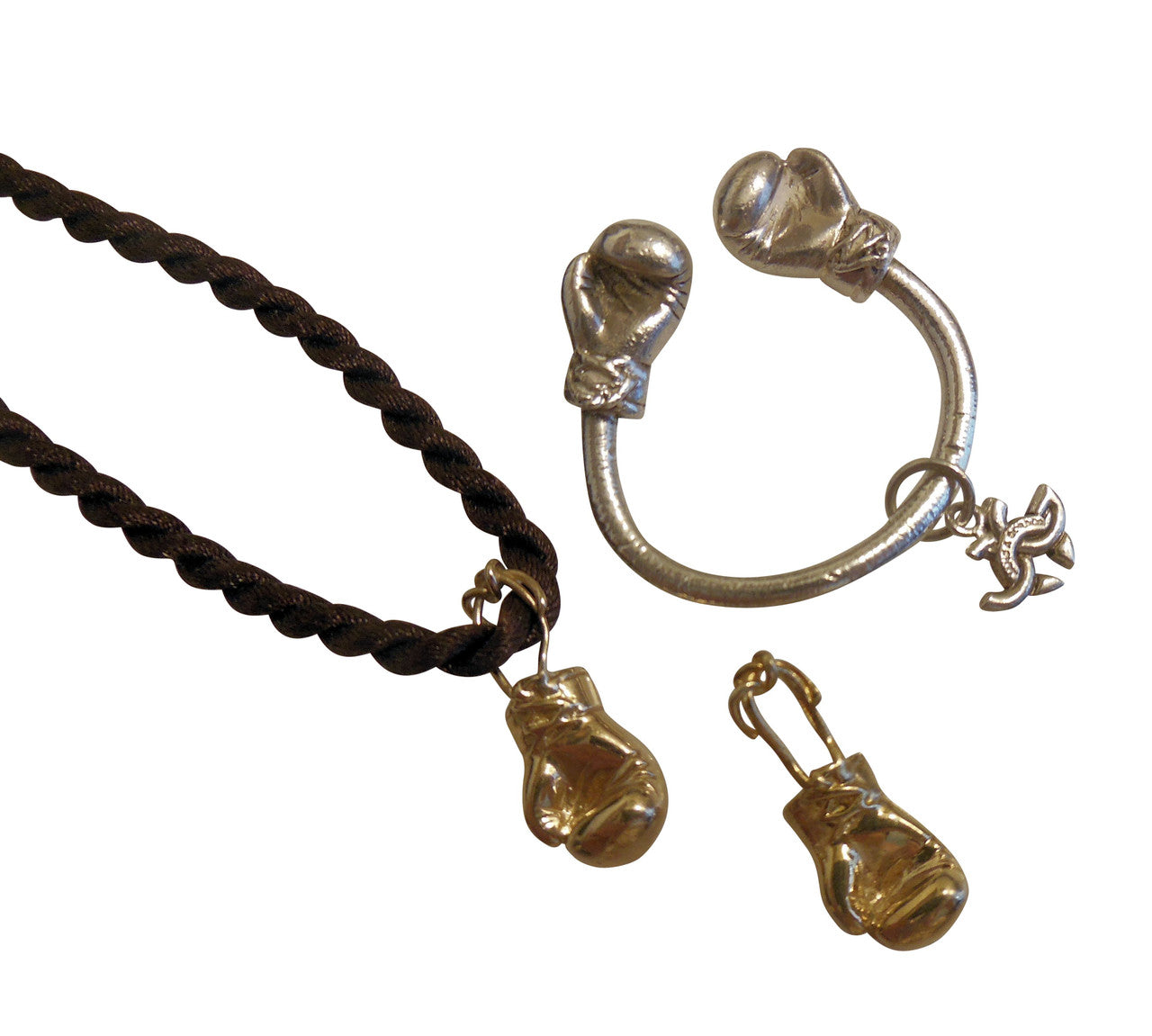 18K Gold Boxing Glove Key Ring with a motivational backdrop