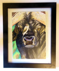 Framed Buffalo and Oxpecker artwork by Moses Eye in vibrant colors