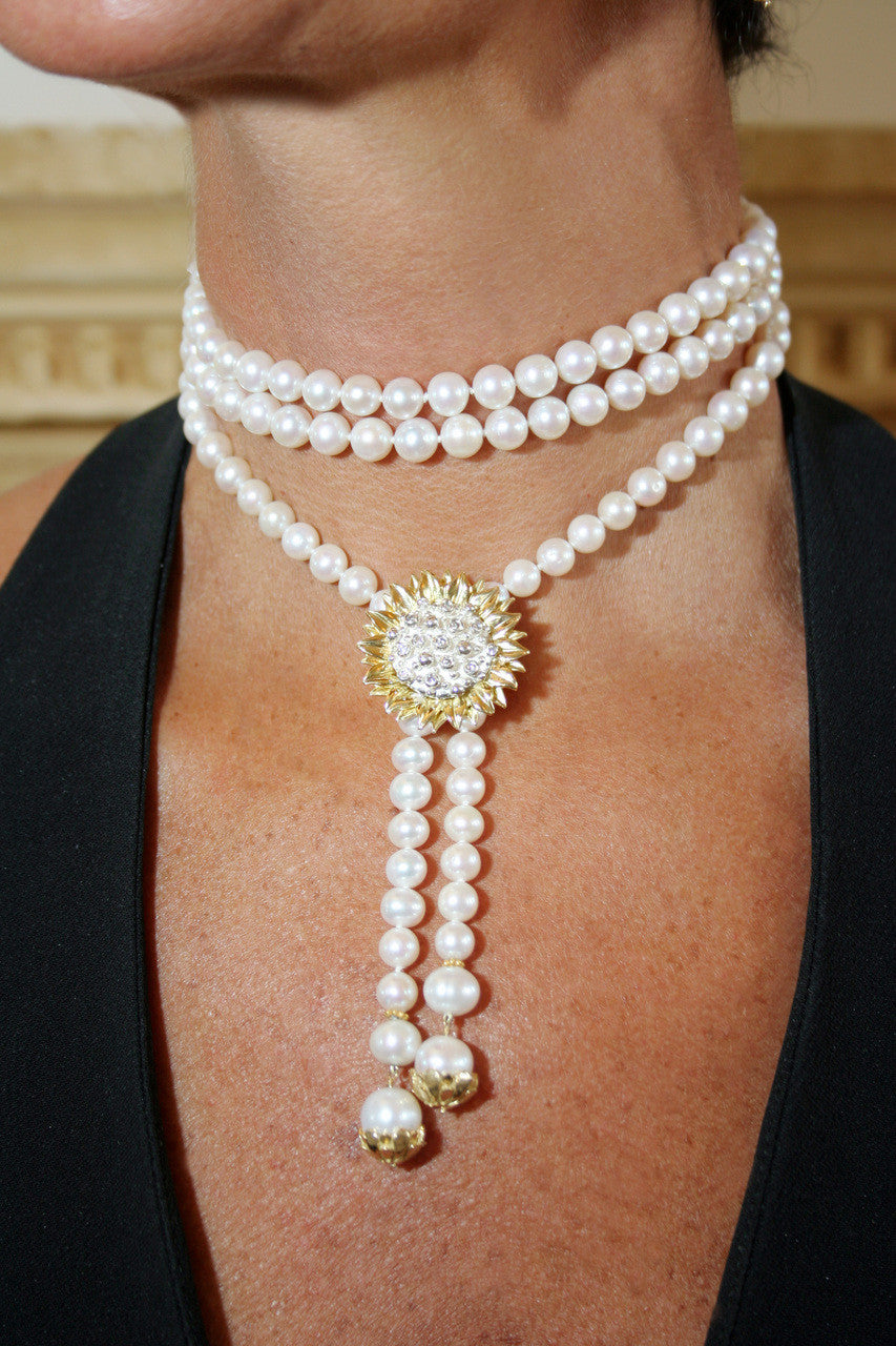 Elegant Pearl Lariat displayed on luxury velvet background