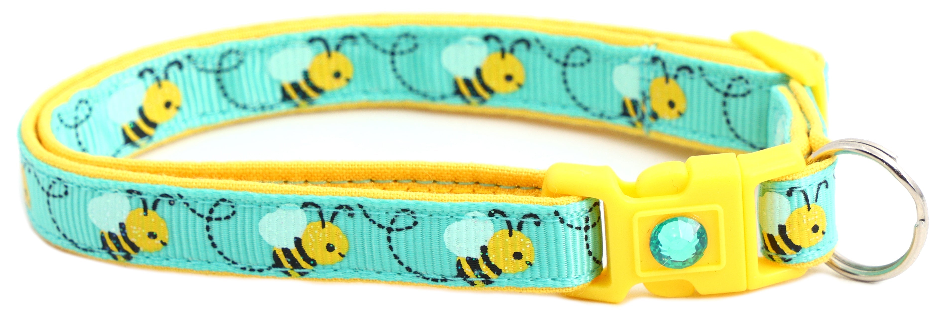 Elegant display of Handmade Honey Bees Cat Collar on a shelf