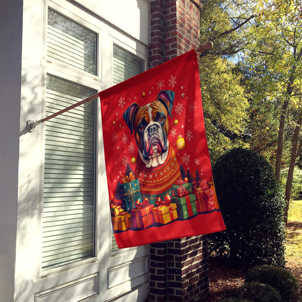 Joyful Boxer Christmas House Flag displayed in a winter garden