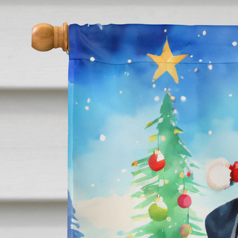 Cane Corso Christmas House Flag hanging in a festive garden setting
