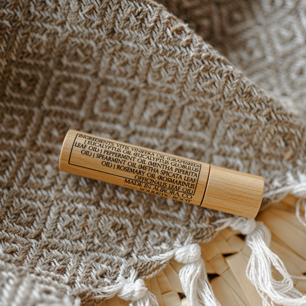 Eucalyptus Mint Bamboo Roller on a calming background