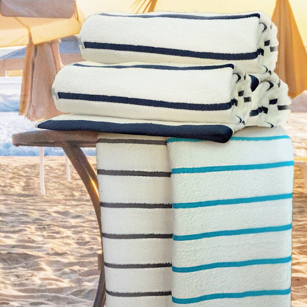 Nautical Stripes Cotton-Poly Pool Towels set displayed by the pool