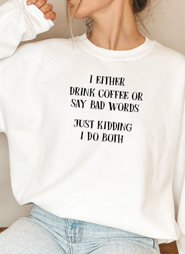 Model wearing I Either Drink Coffee Or I Say Bad Words Sweatshirt outdoors