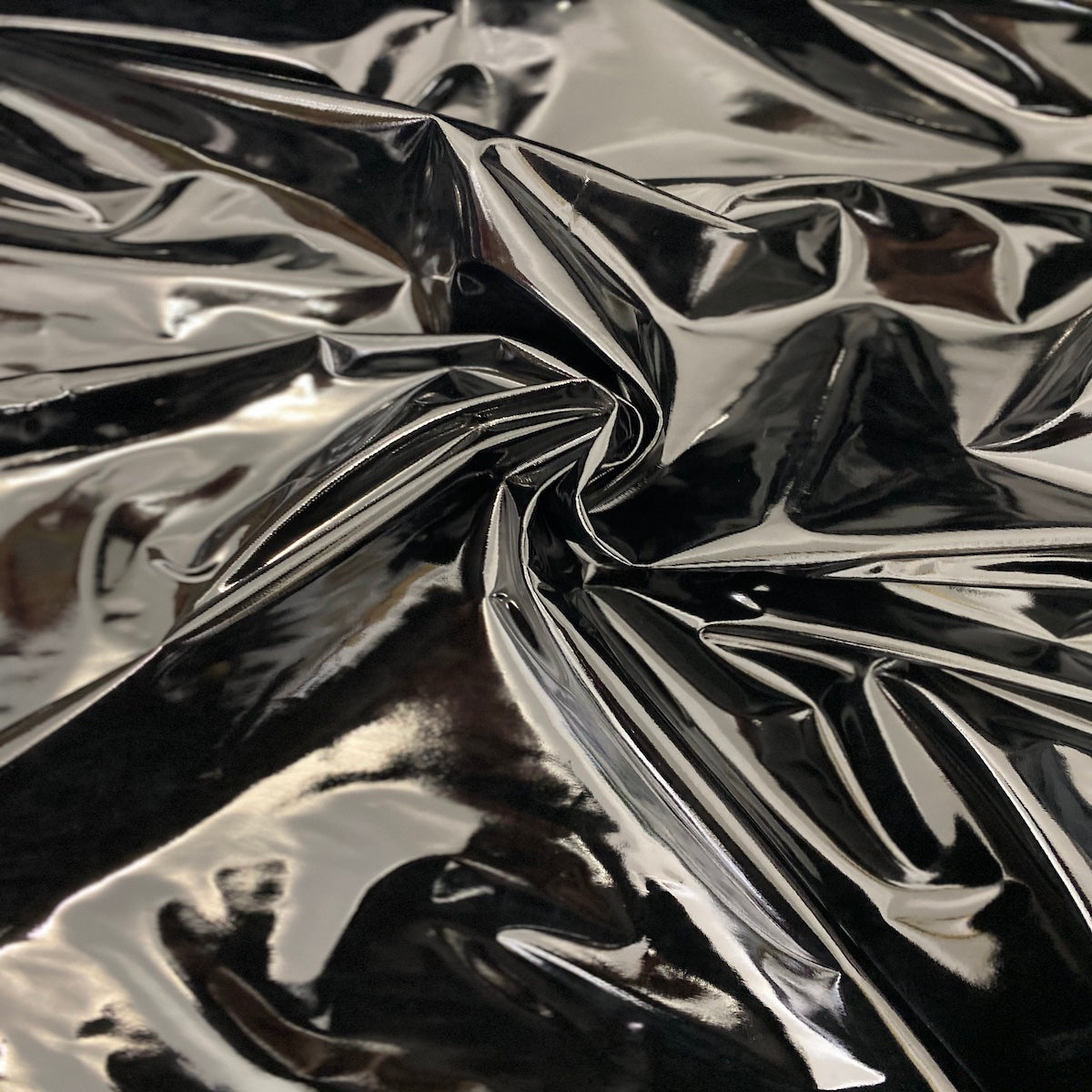 Luxurious Faux Patent Leather Vinyl Fabric with textured detail