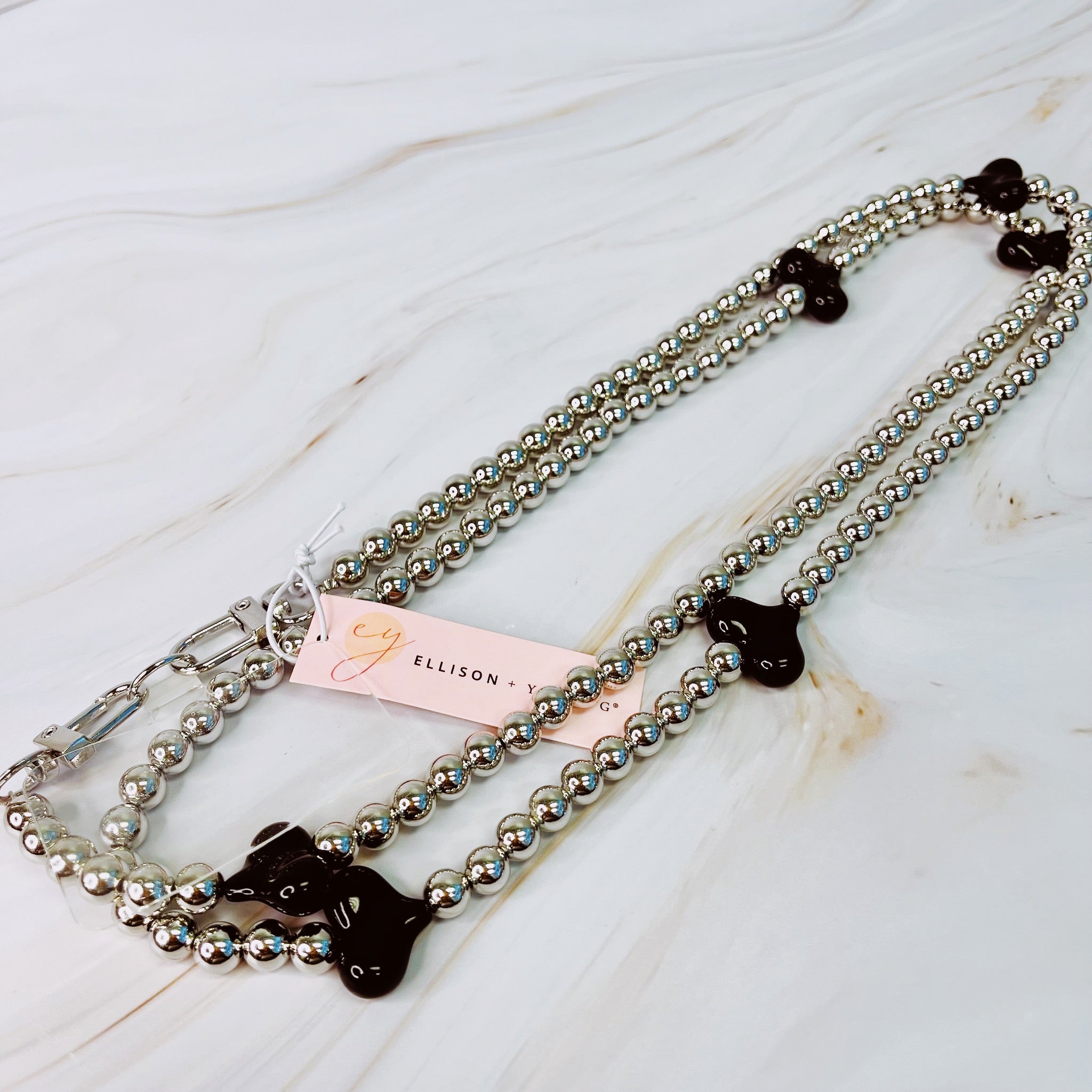 Back view of Hearts and Beads Crossbody Phone Lanyard showcasing attachment