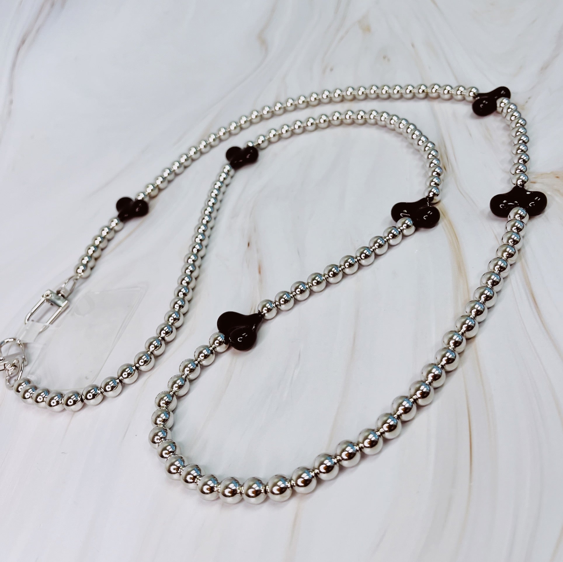 Front view of Hearts and Beads Crossbody Phone Lanyard by Gobingya