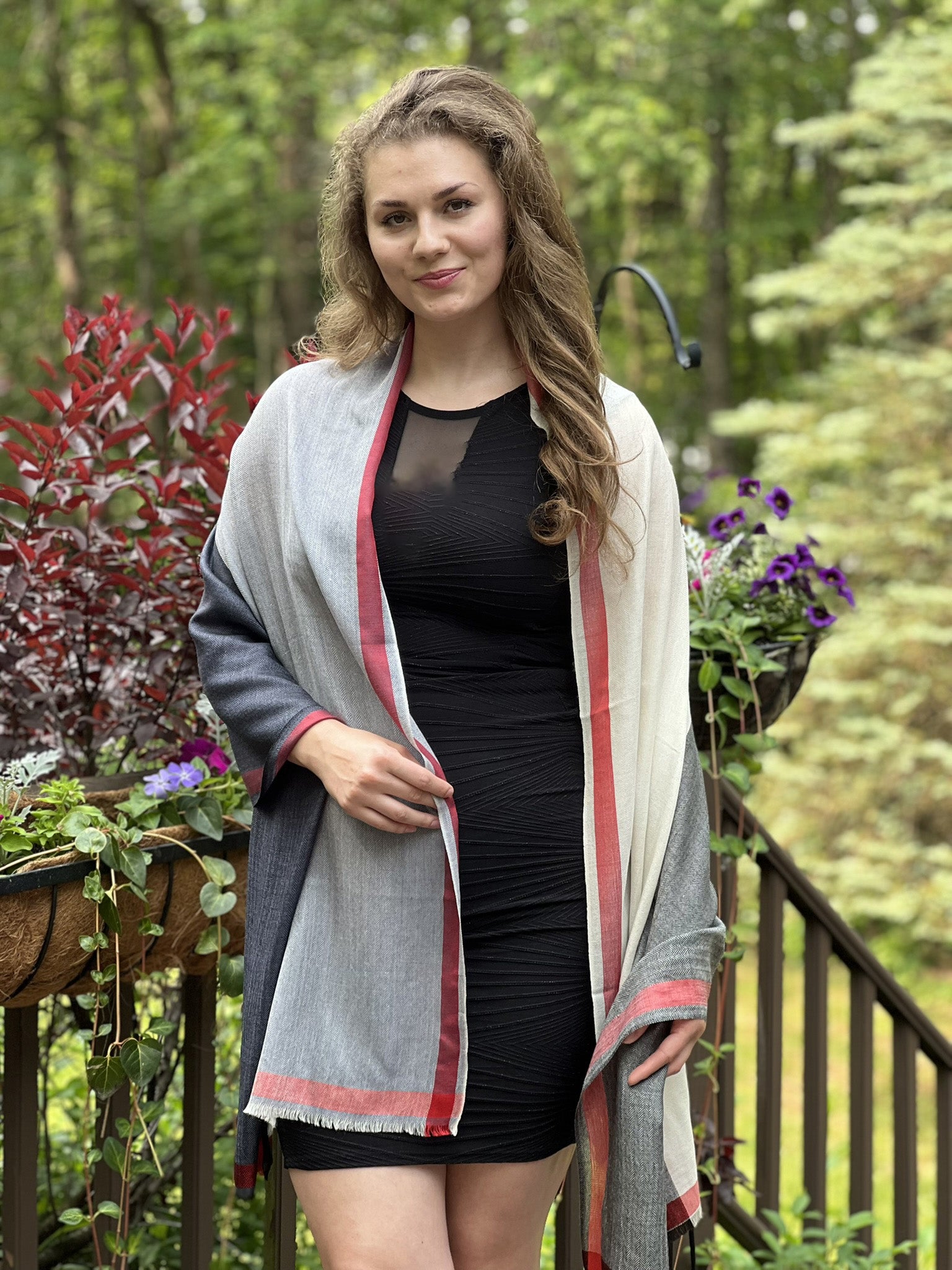 Lifestyle shot of Premium Black and White Plaid Wool & Silk Scarf with accessories