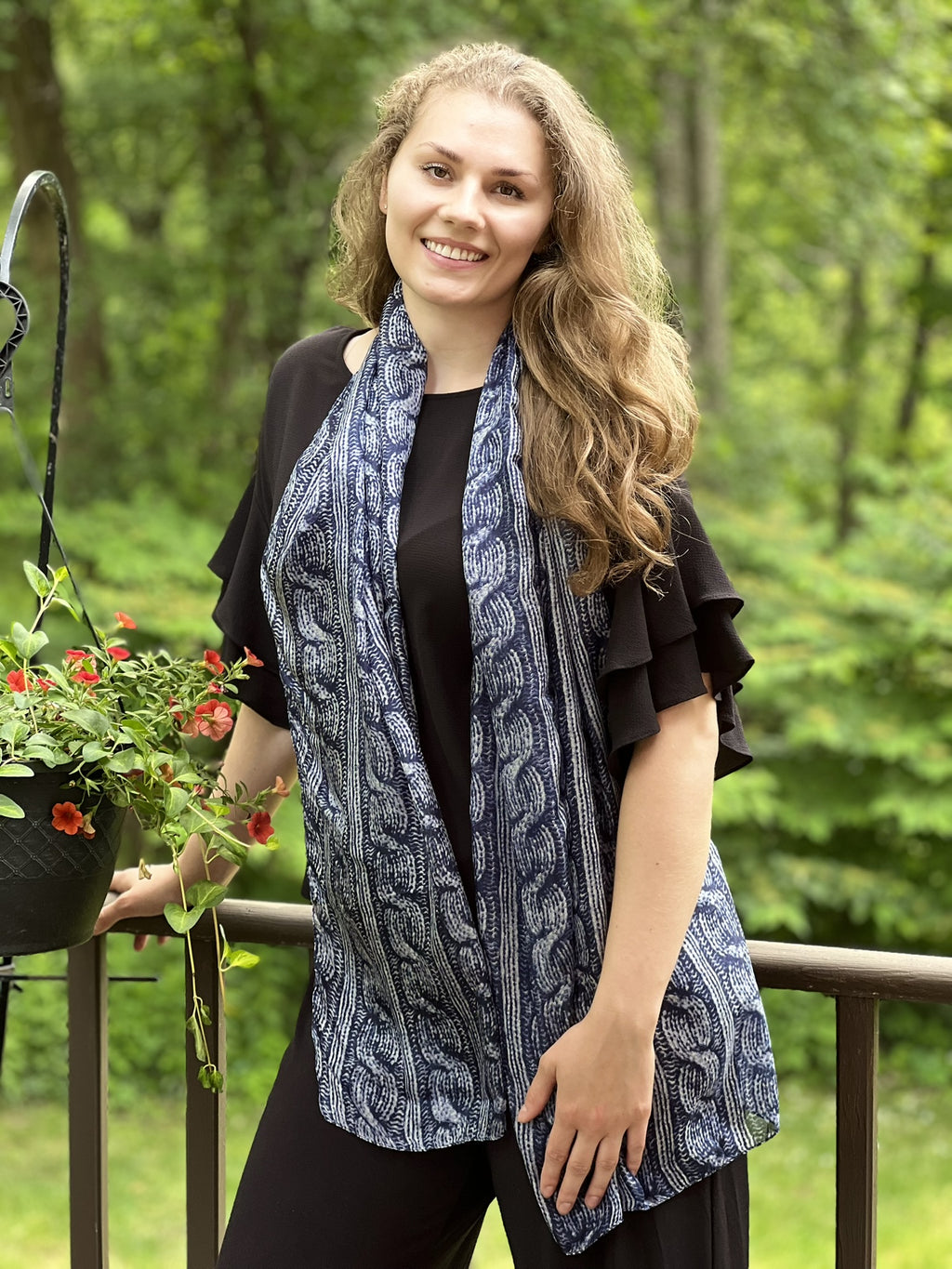 Navy Blue Silk Scarf folded neatly, emphasizing its soft texture by Gobingya