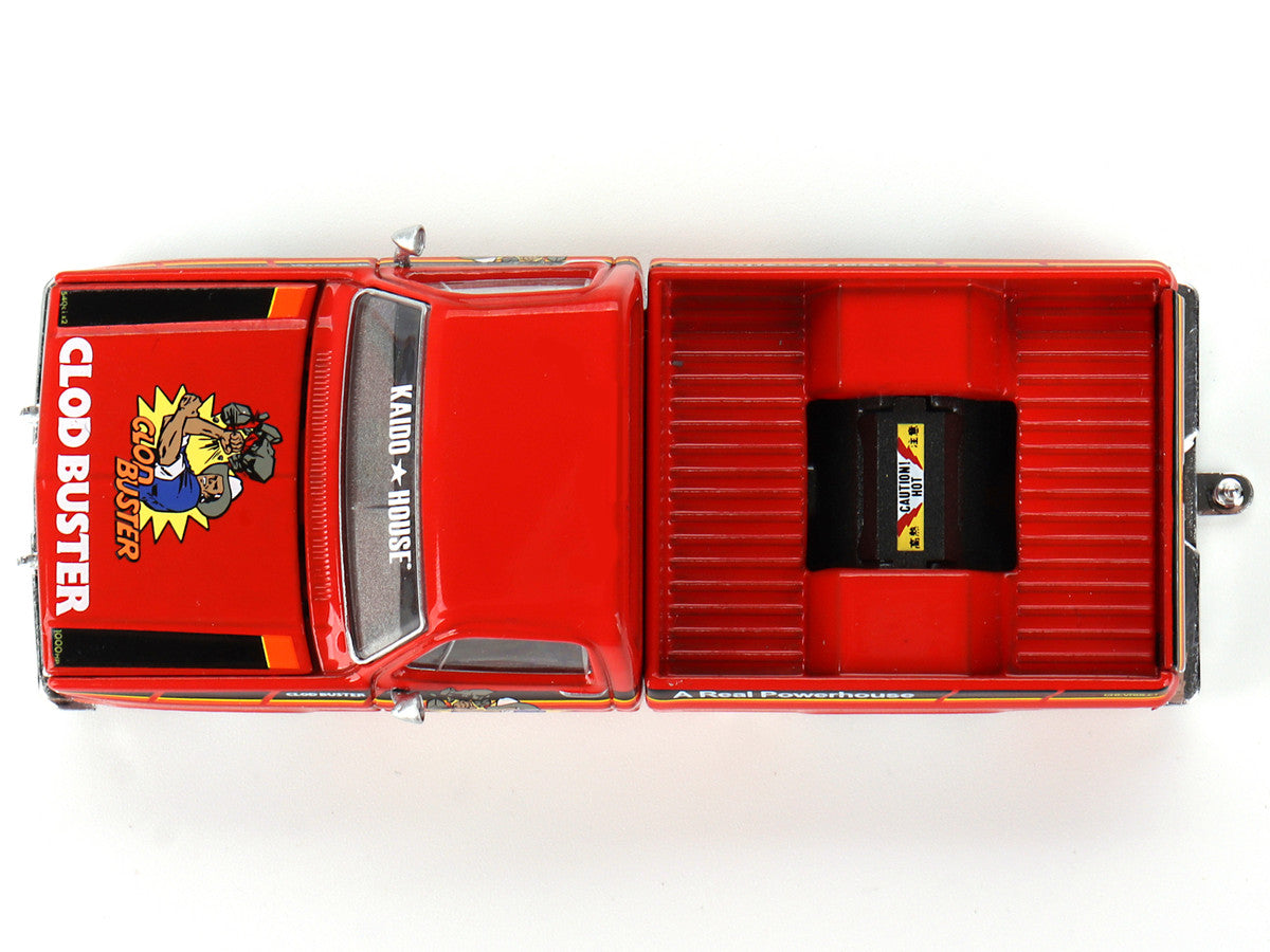 Detailed interior of Chevrolet Silverado Clod Buster diecast model in orange