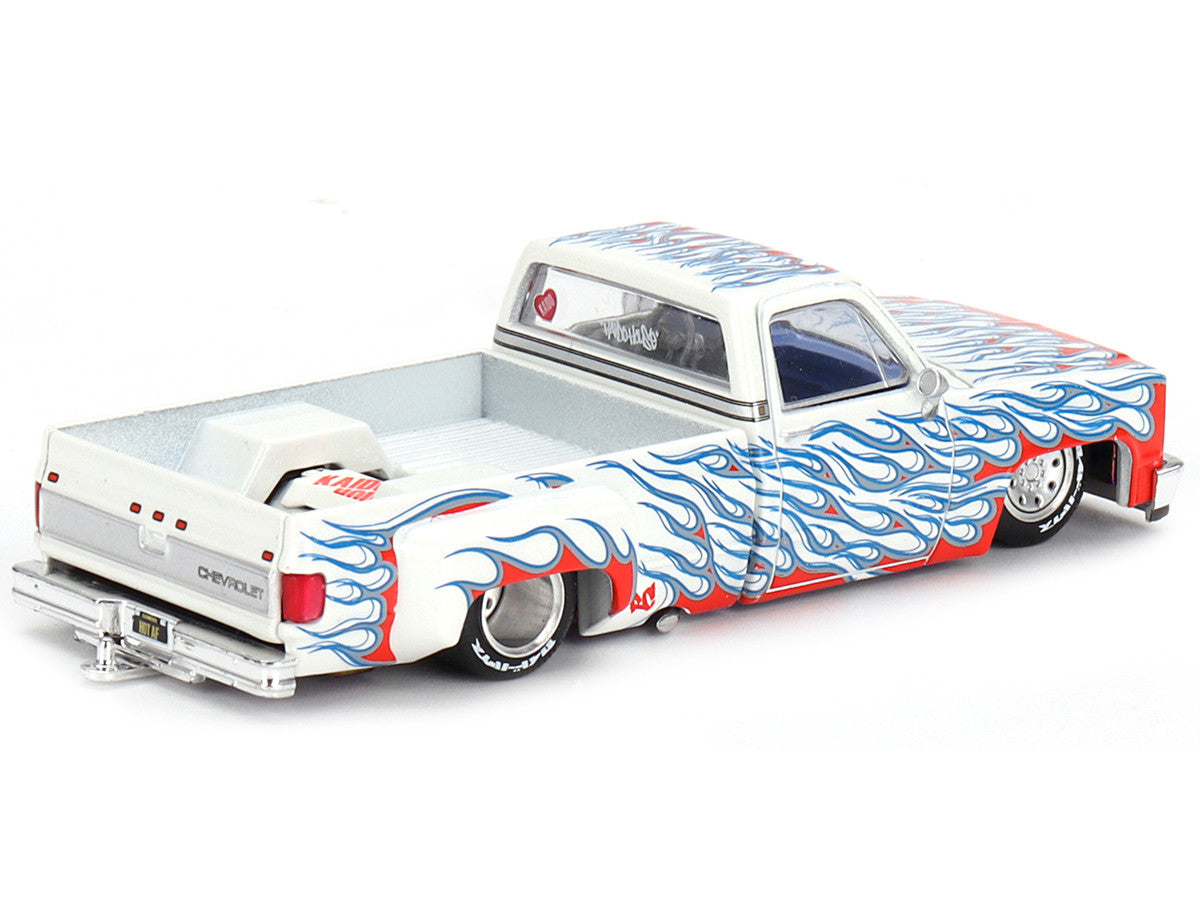 Rear view showcasing the vibrant blue flames on Chevrolet Silverado Dually Diecast Model