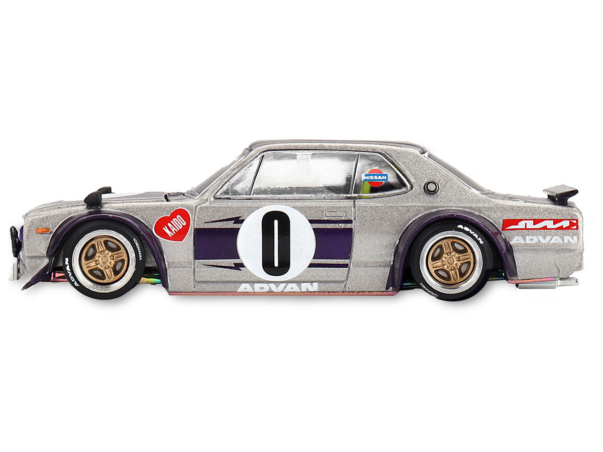 Nissan Skyline 2000GT-R diecast model displayed on a collector's shelf